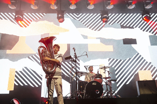 Tom Kelly (tuba) and Sam Wilson (drums) on stage during Anna Meredith's show at Edinburgh International Festival