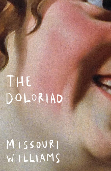 Extreme close up on a grinning face with curly hair. Text overlaid on image reads 'The Doloriad, Missouri Williams'