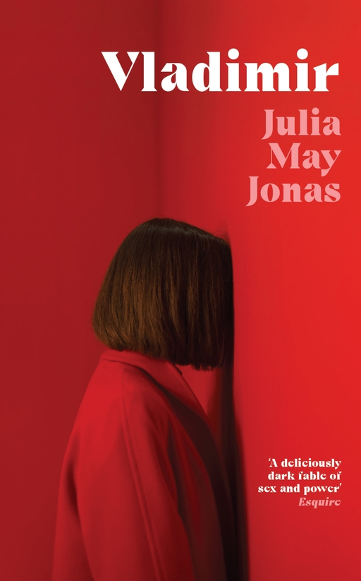 A woman leans face-first against a wall; the entire image is bathed in a red light. Overlaid text reads 'Vladimir by Julia May Jonas', and 'A deliiciously dark fable of sex and power - Esquire'
