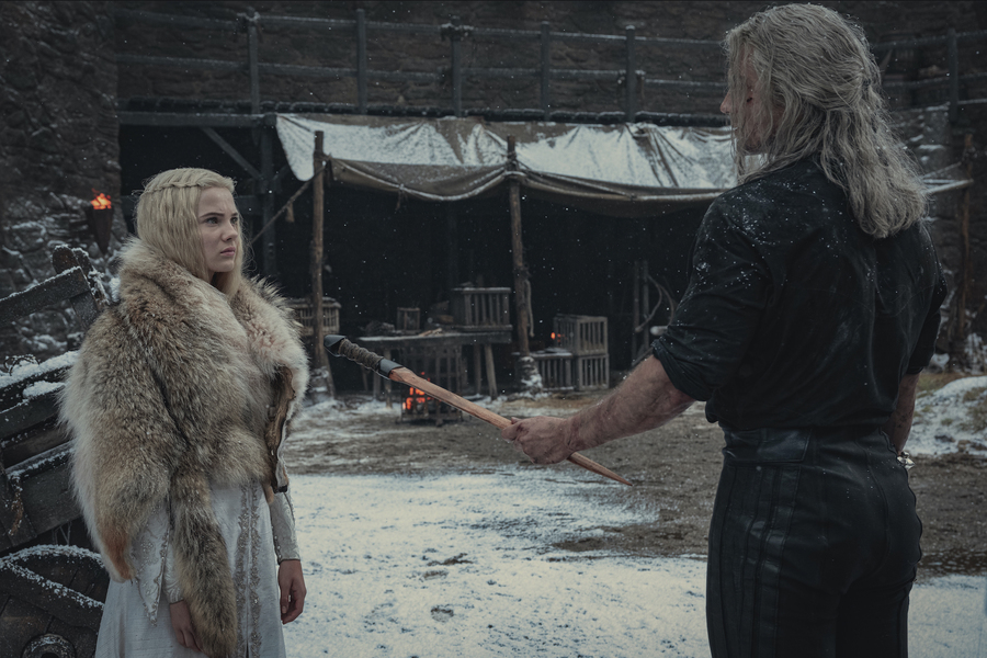Freya Allan (L) and Henry Cavill (R) in a still from The Witcher