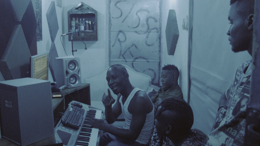 Singeli musicians in a small recording studio.