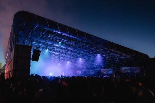 A blue-lit stage at Dekmantel Festival.