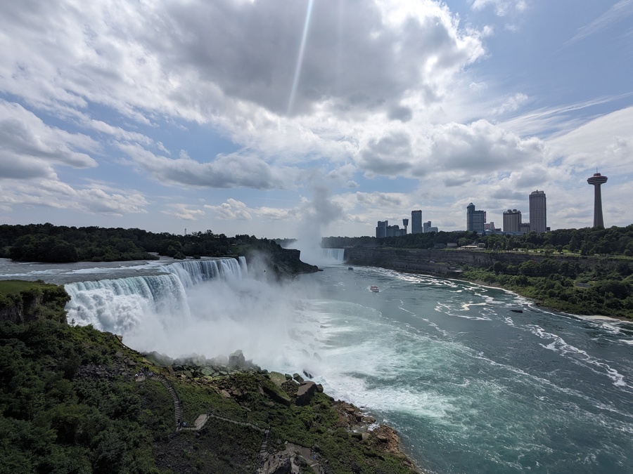 Niagara Falls, with the Toronto skyline visible on the right of the image.