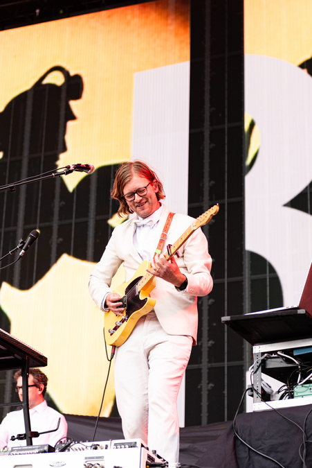 A member of Public Service Broadcasting on stage at Connect Festival.