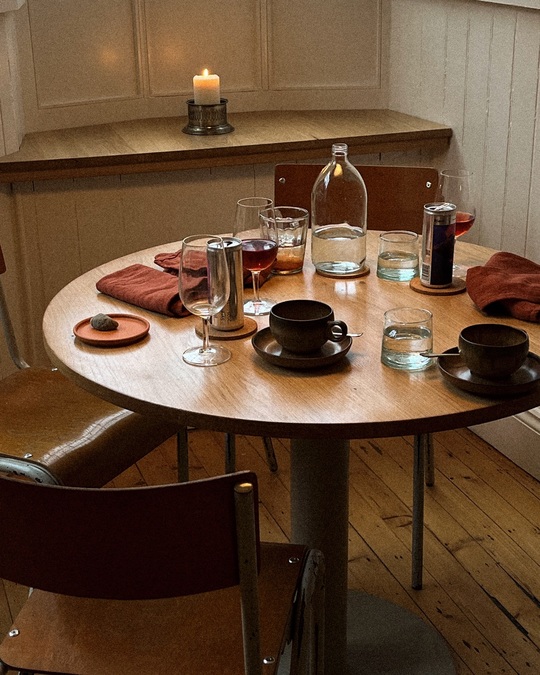 A table at Montrose, topped with various glasses and tableware.