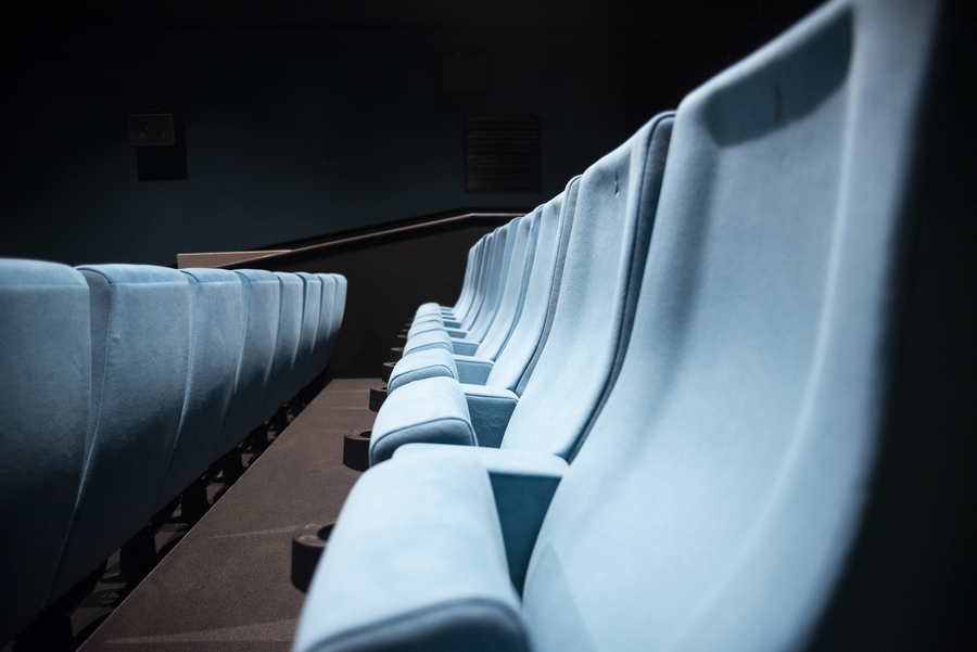 Photo of a row of blue seats at the Filmhouse.