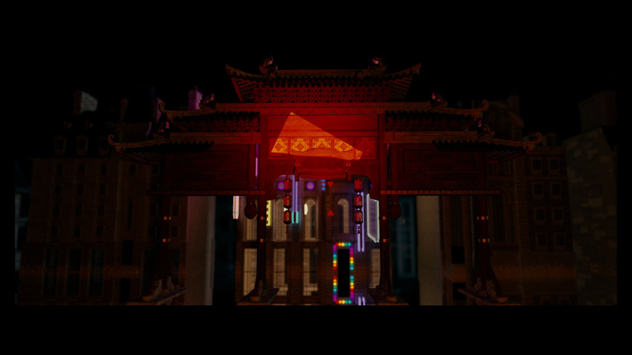Photo of lights projected onto the wall of a building.