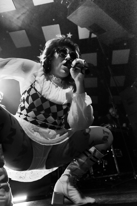 Black and white photo of CMAT performing at the Barrowlands, Glasgow.